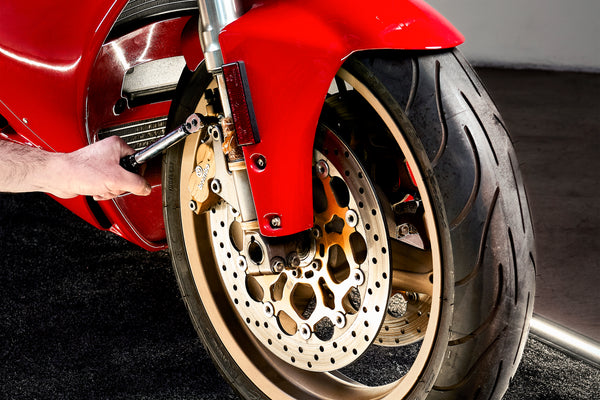 servicing ducati 996 brakes on a GFC LED illuminated motorcycle mat