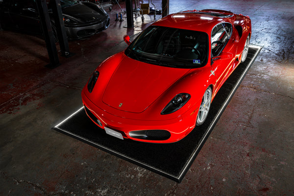 large floor mat for garages fits cars an has build in LEDs
